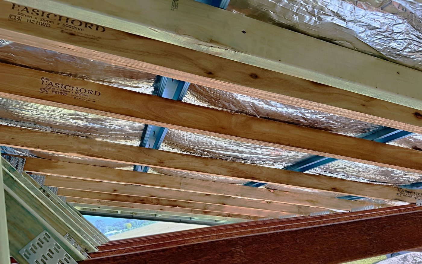 EasiChord LVL rafters stamped E14 H2 under foil insulation